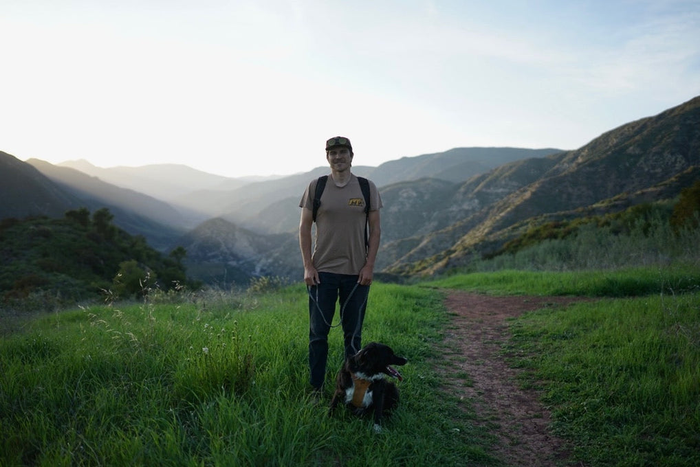 Bridger and Dillon sit by a trail they've built in California.